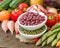 Mung and azuki beans in a bowl and vegetables