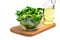 Mung bean salad leaves, corn salad in a glass bowl on a wooden board, isolate.