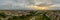 Munich from above at springtime, panoramic view over the bavarian city at sunrise. Overview over many houses including