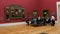 Munich, Germany - December 17, 2019: A group of visitors to art lovers discuss paintings. Old Pinakothek. Exposition of