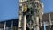 Munich, Germany. Famous Marian Column in front of New City Hall Neues Rathaus at Marienplatz Mary`s public square. Carillon