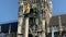 Munich, Germany. Famous Marian Column in front of New City Hall Neues Rathaus at Marienplatz Mary`s public square. Carillon