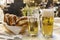 Munich, Germany - February 8, 2019 : Classic German dinner of fried sausages with braised cabbage on large white plates with light