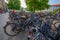 Munich, Germany - July 30, 2015: Pubic bicycle parking station with countless bikes standing lined up