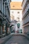 Munich, October 29, 2017: Perspective view of alley, narrow street intersection surrounded by modern and historical