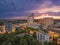 Munich skyline with office buildings at sunset, light in the streets