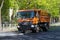 Municipal multifunctional truck `Mercedes Actros` on cleaning the streets. Saint-Petersburg