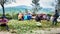 Munnar, India, May 13, 2023: Indian Rural tea pickers with their sacks containing tea leaves at the end of the working day at the