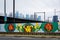 Mural along Spring Garden Street and view of the skyline, in Philadelphia, Pennsylvania