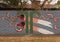 Mural on a barrier wall between Forest Lane and the neighborhood on the North side, painted in 1976 by art students.