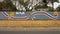 Mural on a barrier wall between Forest Lane and the neighborhood on the North side, painted in 1976 by art students.