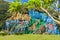 Mural de la Prehistoria The Mural of Prehistory painted on a cliff face in the Vinales valley, Cuba