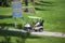 Murcia, Spain, August 25, 2019: Sportman riding a golf cart in the goulf course