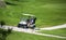 Murcia, Spain, August 25, 2019: Sportman riding a golf cart in the goulf course