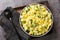 Murcian zarangollo is a vegetable and egg scramble dish of courgette, onion and and Potatoes close up in the plate. Horizontal top
