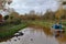 Murky water in autumn on the Bridgewater and Taunton canal in Somerset