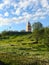 Murmansk lighthouse view from below, enclosed by a fence and a beautiful sky from above. Cityscape of Murmansk - a city