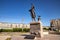 Murmansk, Russia - July 1, 2019: Panorama northern city. Cargo Port gulf of sea. Blue sky. Memorial waiting girl with