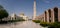 Muscat,Oman - 04.04.2018: Marble courtyard of Sultan Qaboos Grand Mosque. Minaret, dome and arches.