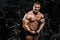 Muscular athletic bodybuilder fitness model posing