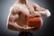 Muscular basketball in sports concept