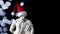 muscular male figure with a Santa Claus hat