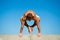 Muscular man balance yoga position. Yoga instructor with muscular body stretching. Sport and health care. Coach