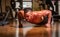 Muscular man doing push-ups on one hand against gym background. Sport. Muscular and strong guy exercising. Slim man