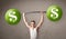 Muscular man lifting green dollar sign weights