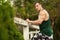 muscular man outdoor. Sporty male in sportswear outside