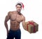 Muscular, santa claus with gift