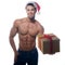 Muscular, santa claus with gift