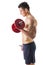 Muscular shirtless young man exercising biceps