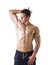 Muscular shirtless young man exercising triceps
