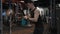 muscular sportsman weightlifting in sport gym. sport sportsman with gym weightlifting machine.
