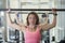 Muscular woman with barbell