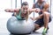 Muscular woman lifting a dumbbell