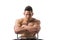 Muscular young bodybuilder sitting on chair