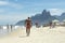 Muscular Young Brazilian Man Walking Ipanema Beach