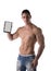 Muscular young man holding a blank tablet PC