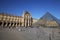 Musee du Louvre, the Illuminated attractive museum in nice sunny day, glassed pyramid in europe, Paris, France