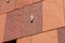 Museum aan de Stroom MAS Striking, red, sandstone museum details of the hand on the facade.