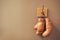 Museum of box sport. Box exhibition retro attributes. Boxing school. Vintage boxing gloves hang on hook wall background