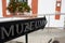 A museum sign post