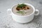 Mushroom champignons  cream soup in a white plate