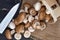 Mushroom cutting. Sliced champignons.