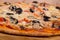 Mushroom and olive pizza