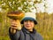 Mushroom picker holding a big white mushroom in her hand