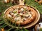 Mushroom pizza, pizza with addition of edible forest mushrooms porcini mushrooms, chanterelle and mozzarella cheese and herbs on