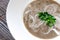 Mushroom soup - mashed champignons, potatoes, onions and coconut